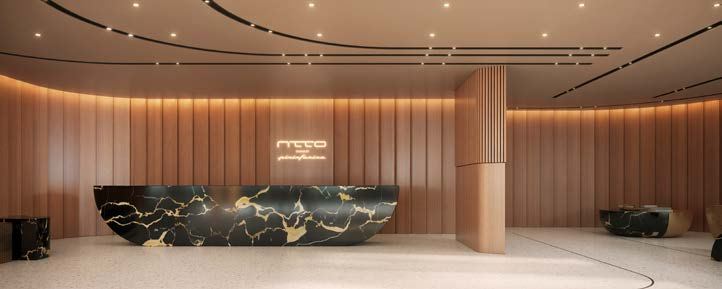 Lobby do Atto by Pininfarina com balcão em mármore e mobiliário desenhado pela Pininfarina