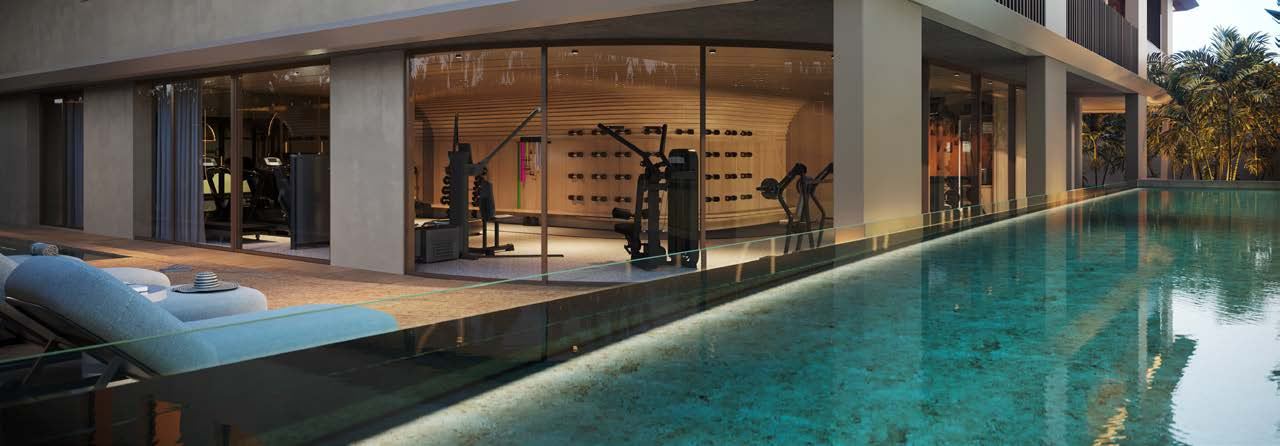 Piscina com raia do Atto by Pininfarina ao lado da academia
