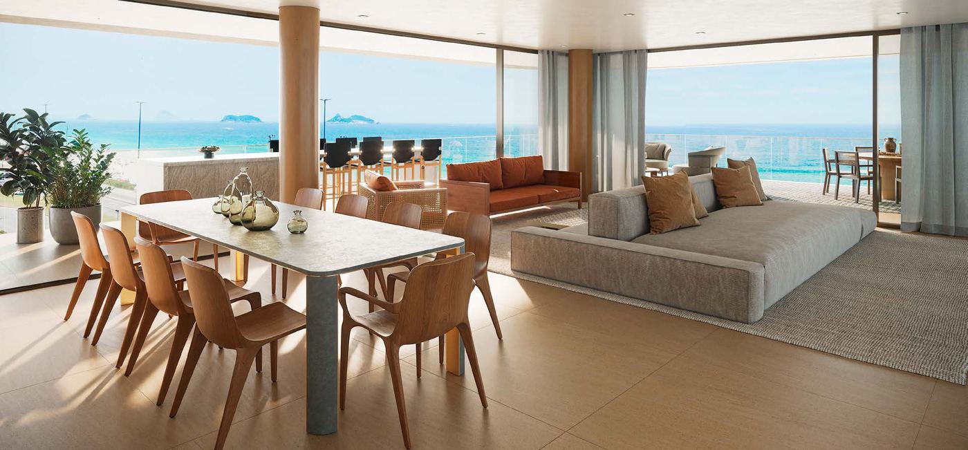 Sala integrada de apartamento do Atto by Pininfarina com vista para o mar